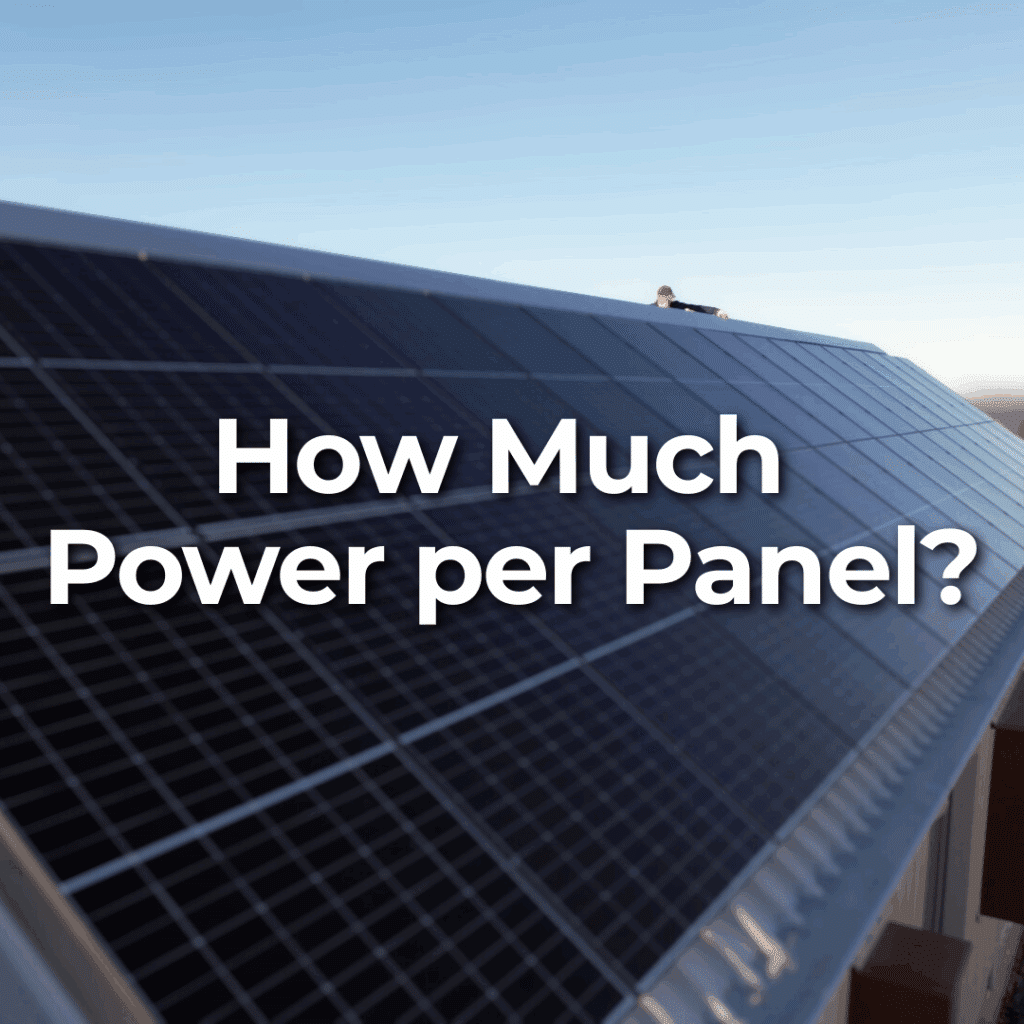 A row of solar panels on a roof with the text "How Much Power per Panel?" displayed in large white letters.