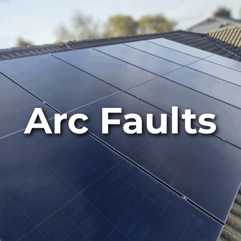 Close-up of rooftop solar panels with the words “Arc Faults” prominently displayed in bold white text.