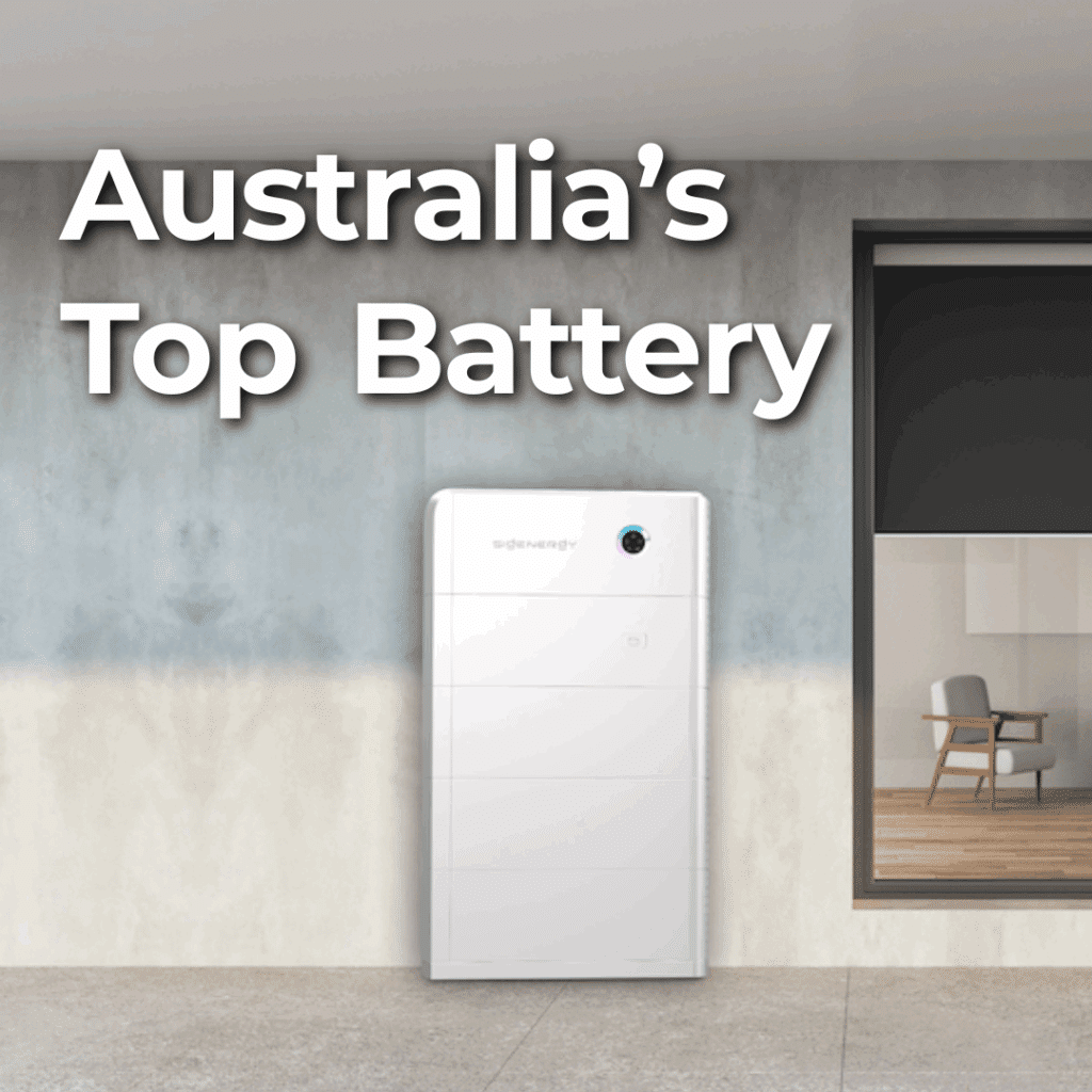 A white battery unit mounted on an exterior wall beneath text reading "Australia's Top Battery"; a window reveals a modern interior with a chair and table.