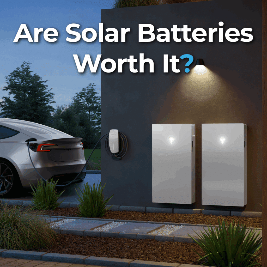 A white electric car charges next to two mounted solar batteries outside a modern home at dusk; text reads "Are Solar Batteries Worth It?".