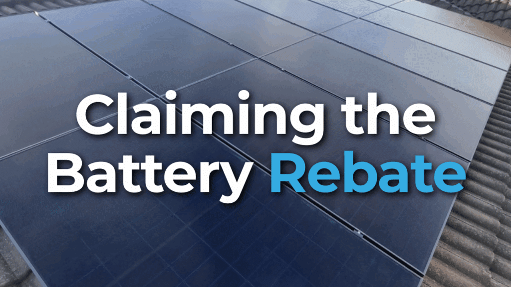 Close-up of rooftop solar panels with the text "Claiming the Battery Rebate" overlaid in large white and blue letters.
