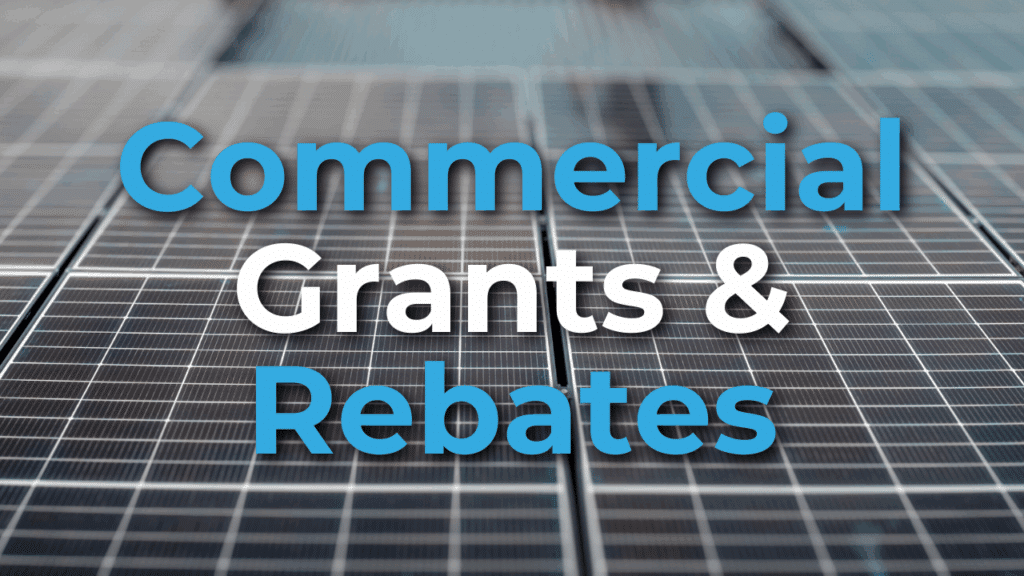 Text "Commercial Grants & Rebates" over a background of solar panels arranged in rows.