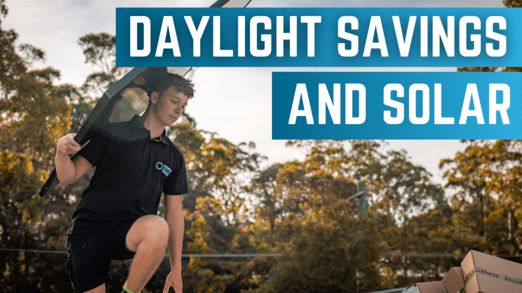 A worker carries a solar panel with text overlay reading "daylight savings and solar.