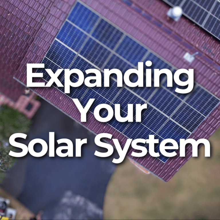 Aerial view of a house roof with solar panels, featuring the text "Expanding Your Solar System.