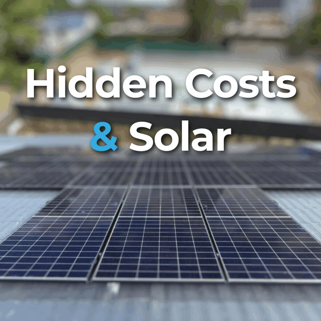 Solar panels on a rooftop with the text "Hidden Costs & Solar" overlaid, suggesting consideration of additional expenses related to solar energy.