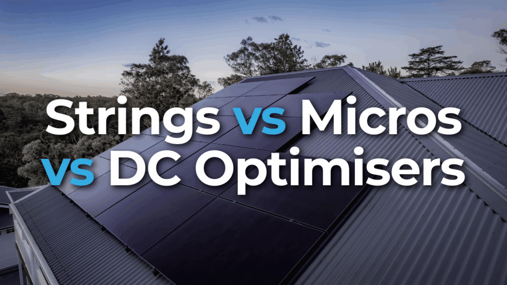 A rooftop with solar panels and large text overlay reading "Strings vs Micros vs DC Optimisers" against a background of trees and sky at dusk.