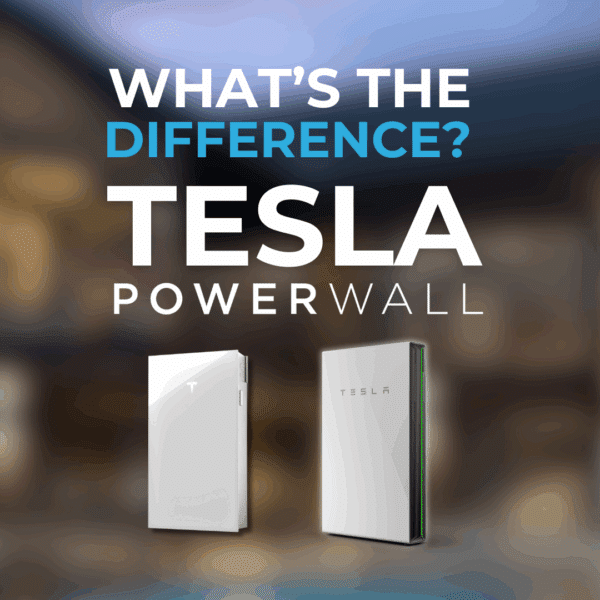 Two Tesla Powerwall battery units are displayed side by side beneath the text “What’s the difference? Tesla Powerwall” on a blurred background.