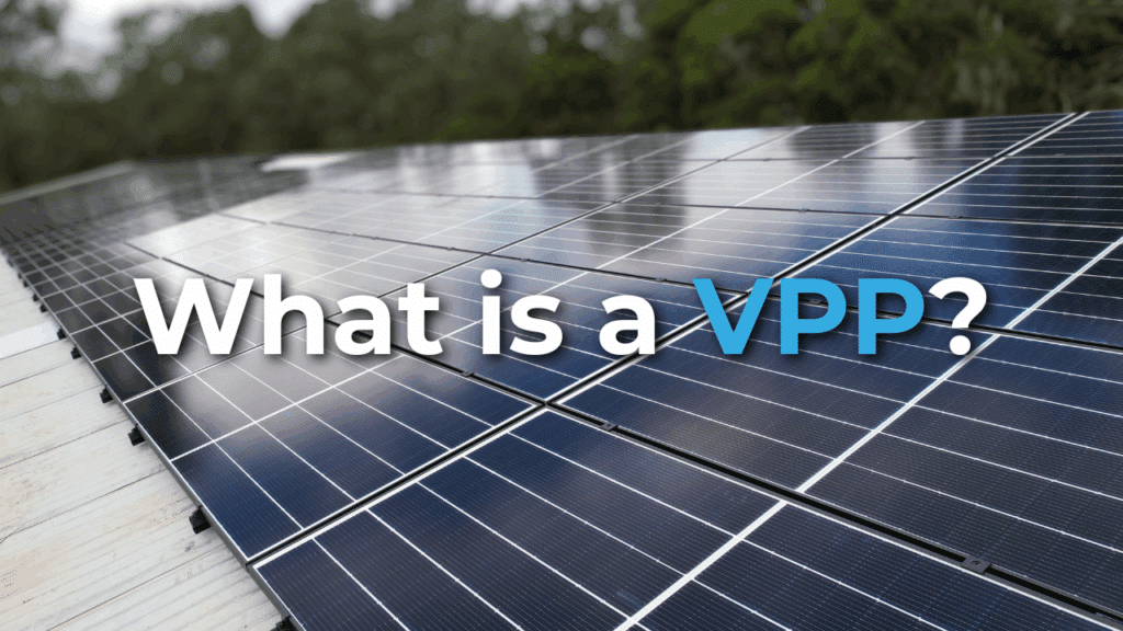 Rows of solar panels on a rooftop with the text "What is a VPP?" overlaid on the image.